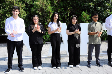 A meeting was held with graduates who scored high marks