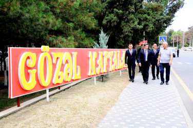 The head of Executive Power with tourists – in "Gözəl Naftalan"