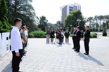 A meeting was held with graduates who scored high marks