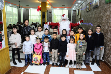 An event was held for the children of martyrs and veterans on the occasion of the New Year holiday